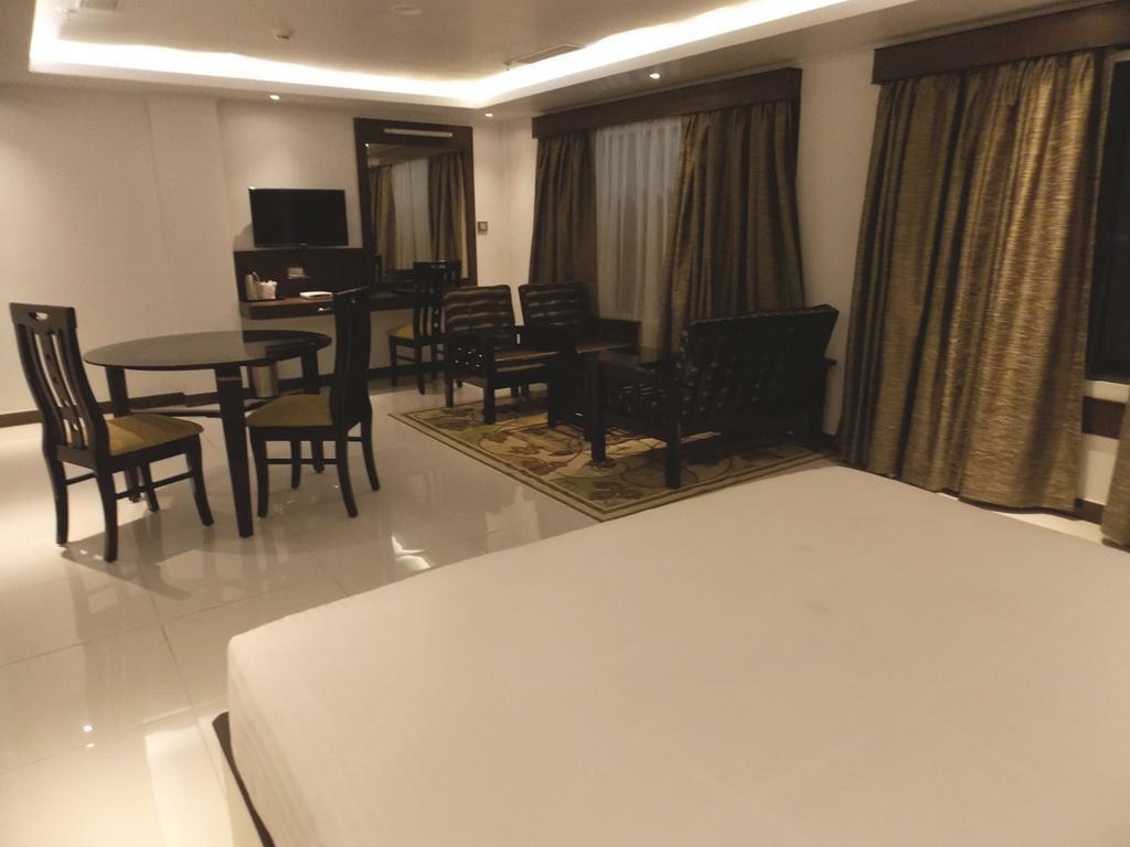 Airport City Hotel Kalkutta Zimmer foto